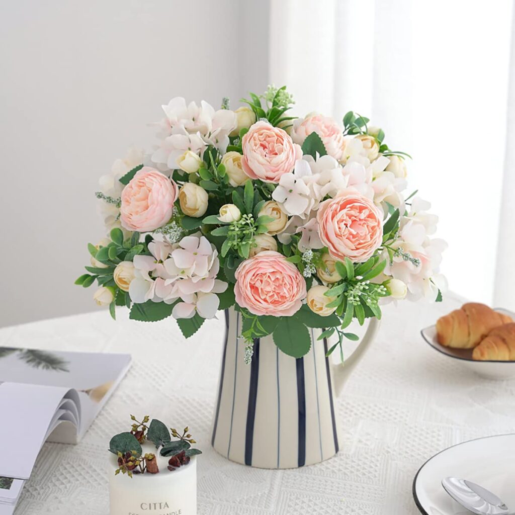 Elegant faux flower centerpiece with mixed peonies and eucalyptus