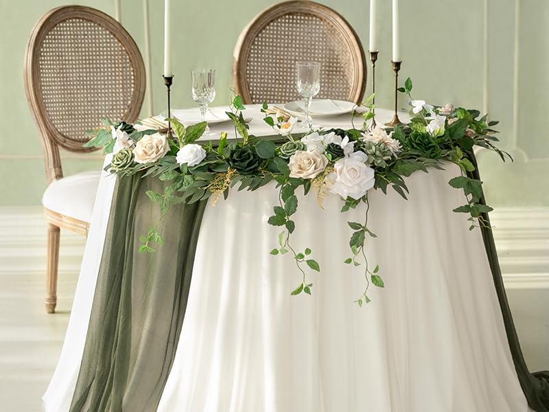 faux garlands on photo booth and welcome table