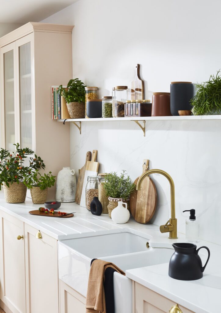 Faux rosemary in kitchen shelf decor