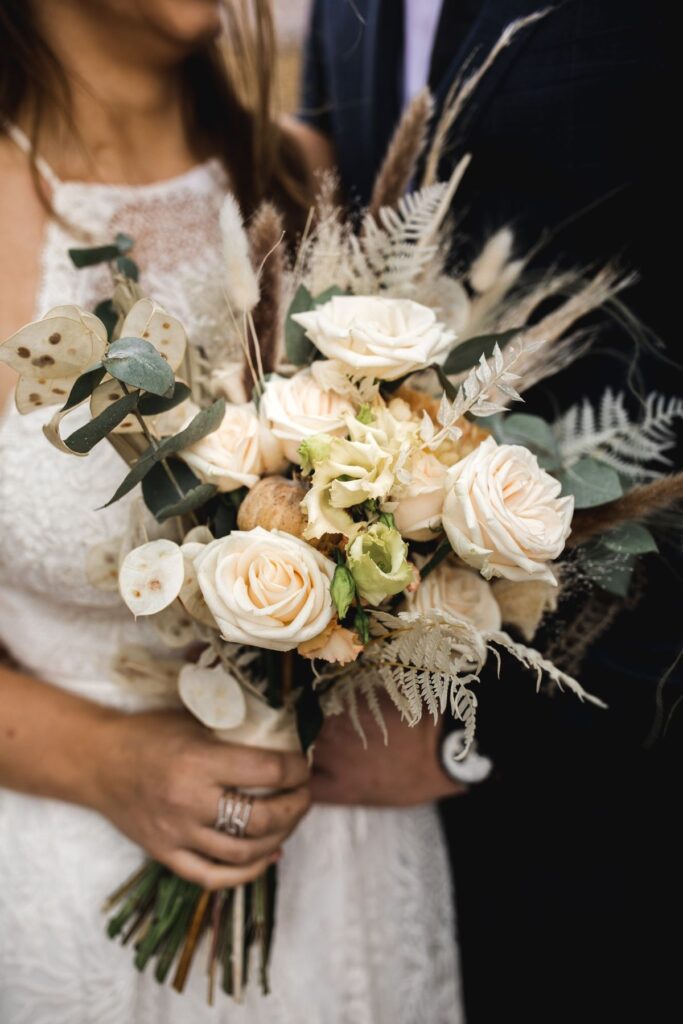 Fresh flower bouquet wilting under hot outdoor wedding condition
