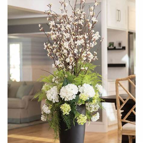 balanced faux flower arrangement with height tiers