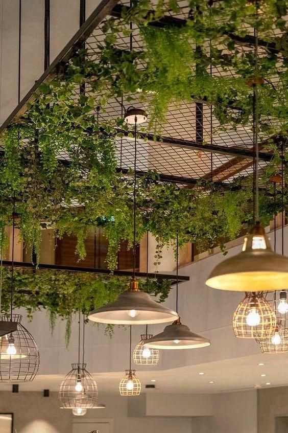 Lightweight materials make faux greenery ceiling installations simple and renter-friendly