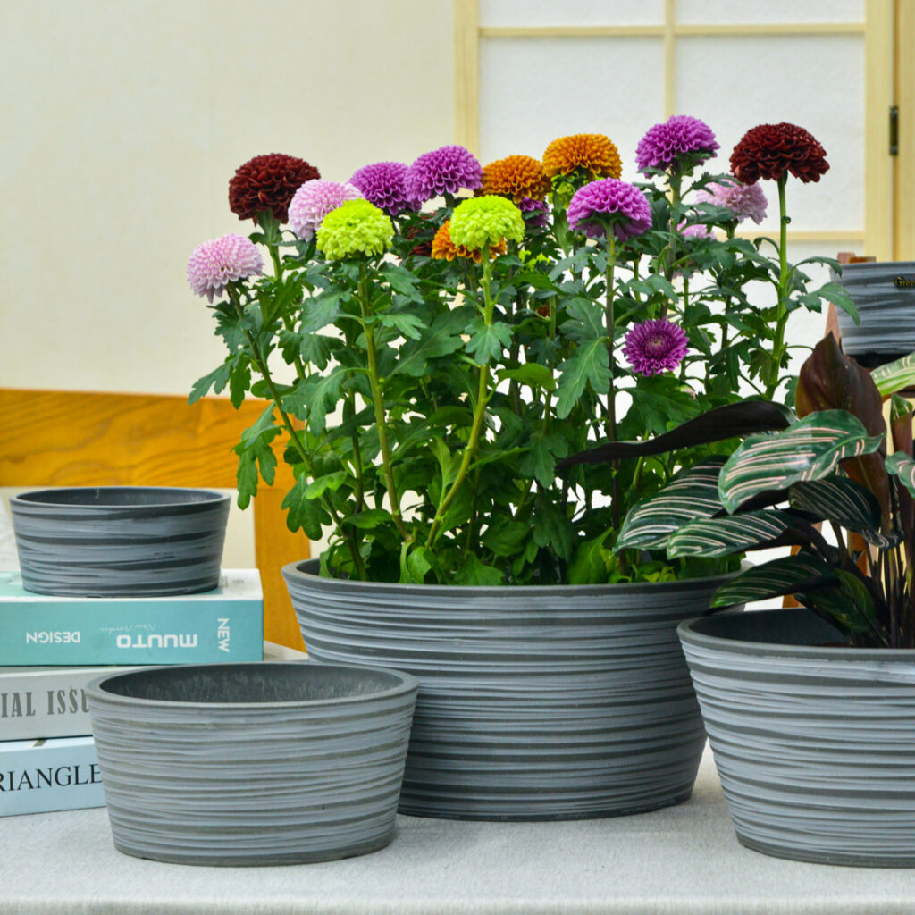 fake flower planter materials fiberglass metal concrete comparison