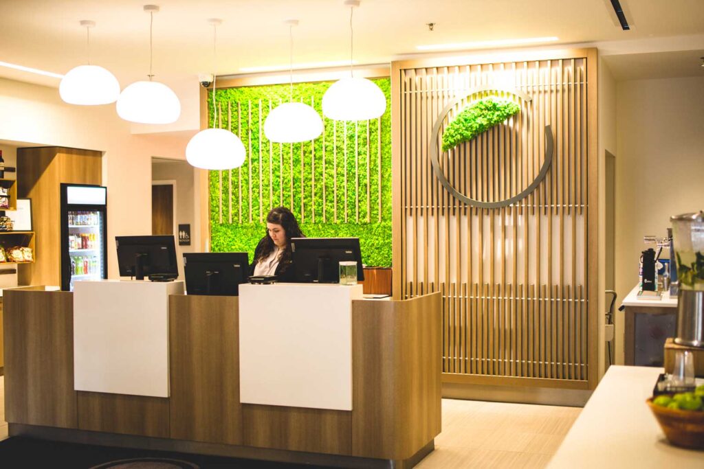 why hotels use hotel décor faux plants lobby reliability
