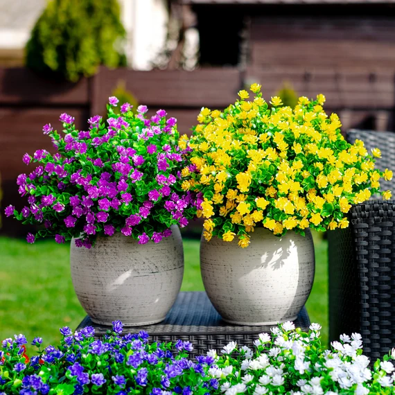 anchoring secure outdoor artificial flowers with pins straps and plates