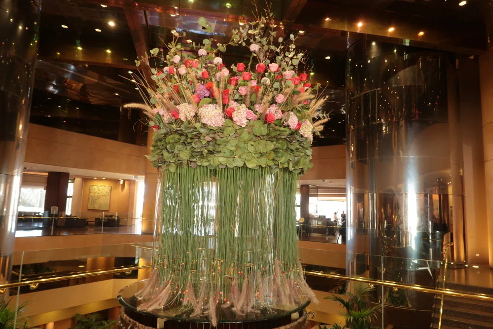 how to dust artificial flowers in hotel lobby