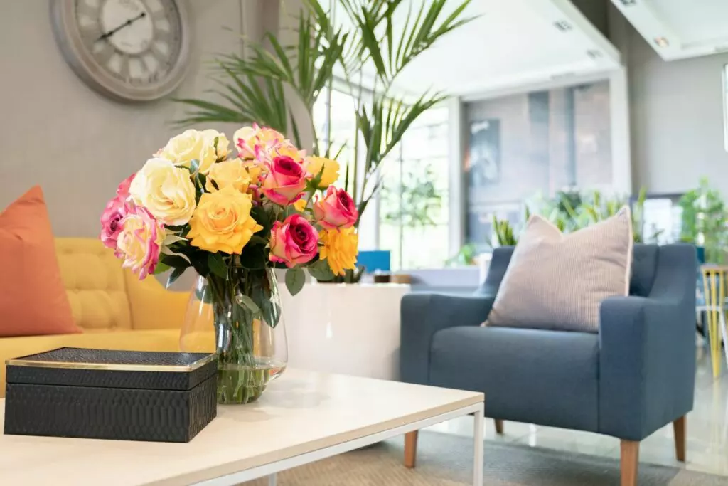 clean silk flowers in a beautiful living room arrangement looking fresh and vibrant