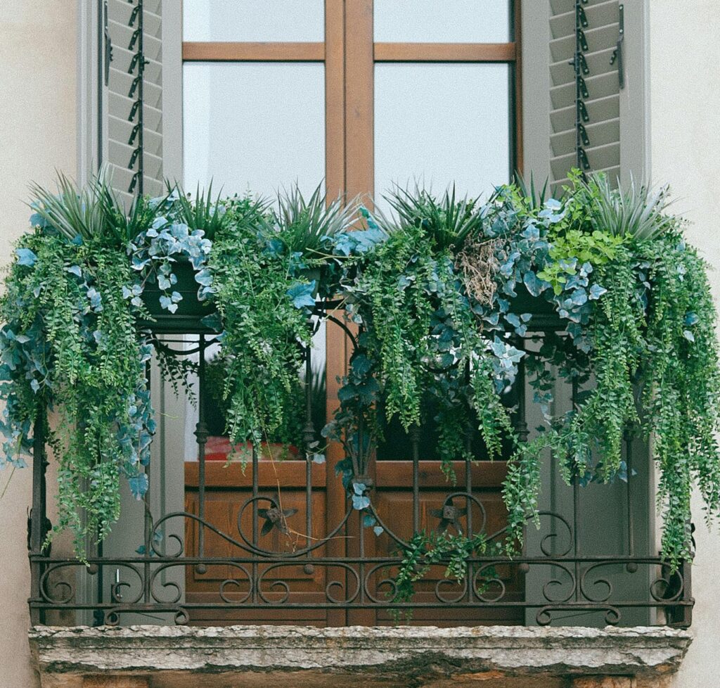 buyers checking artificial plants for outdoors with uv protection sample quality