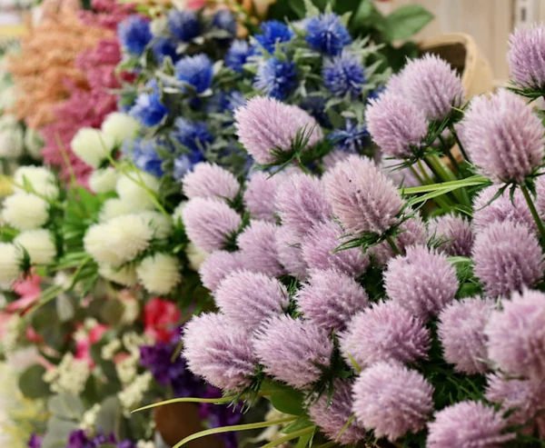 dry cleaning versus light damp cleaning for silk flowers