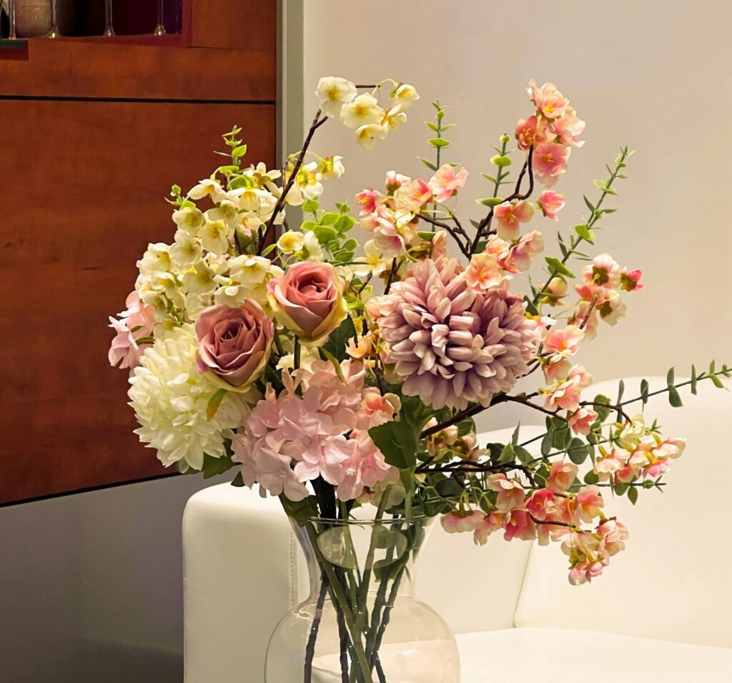 fire retardant artificial flowers in hotel lobby installation