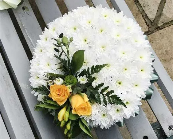 why artificial grave flowers are still used in cemeteries