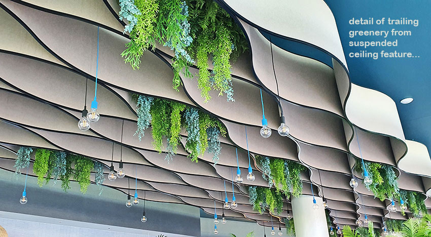 luxury hotel hospitality faux greenery ceiling installation