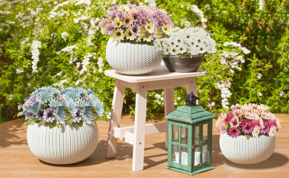 maintain fake flowers in outdoor planters for commercial use