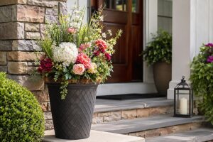 ![filling outdoor planter with artificial flowers, arranging vibrant faux blooms in garden planter](http://botanicblossoms.com/wp-content/uploads/2025/04/How-To-Fill-An-Outdoor-Planter-With-Artificial-Flowers-1.jpg "Outdoor Flower Planter")