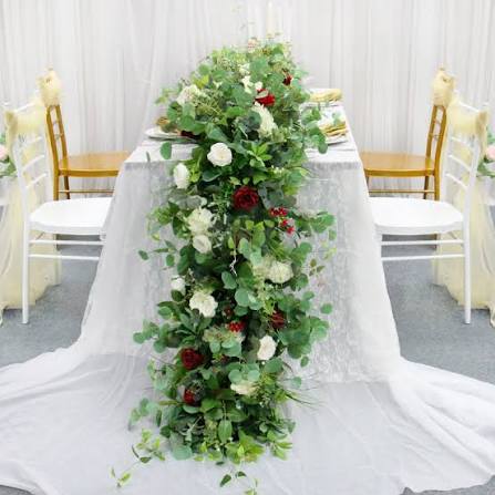 artificial greenery for event decoration on arches walls and tables