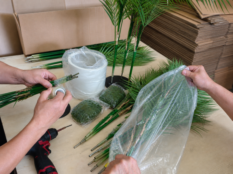 Artificial foliage trunk and planter samples reviewed for a commercial tree project