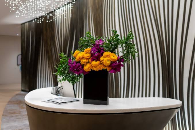 commercial faux flower arranging tips for hotels offices and events