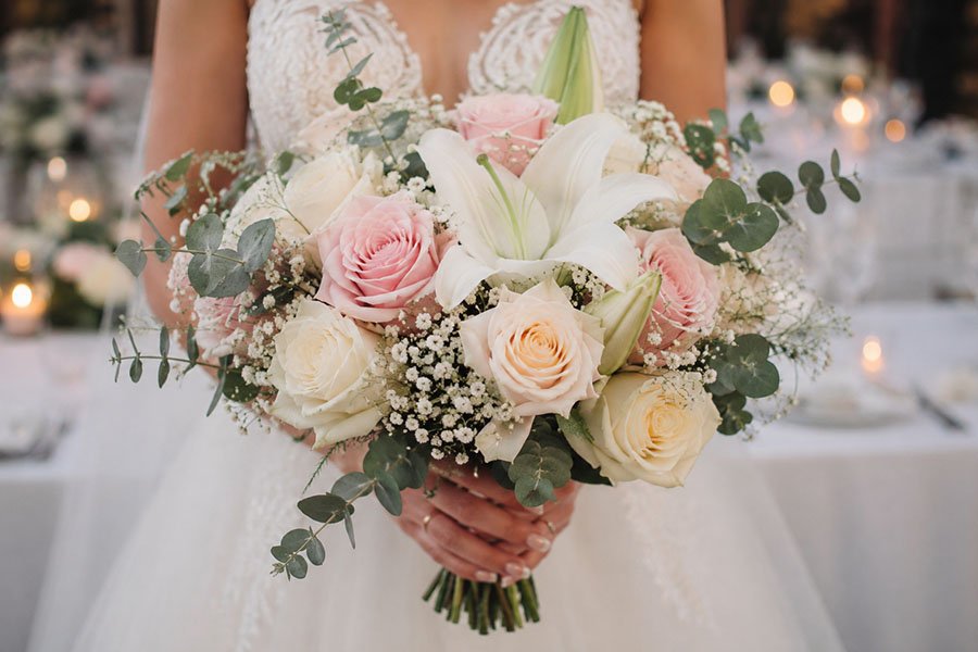 Can You Describe the Flowers in the Bride’s Bouquet?