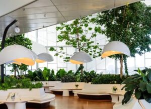 artificial flowers for office decoration with greenery in commercial workplace