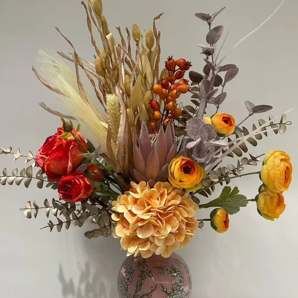 Autumn artificial flower arrangement with roses, hydrangea, berries, and decorative foliage